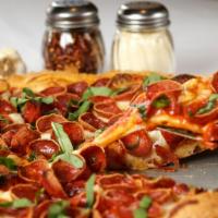 Nicolosi'S Sicilian Pepperoni Pizza · Pepperoni on top, Fresh Basil, light Fresh Mozzarella.