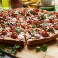 Halal Tandoori Pizza Twist · This pizza has our signature tandoori sauce, halal chicken, fresh diced mozzarella cheese, f...
