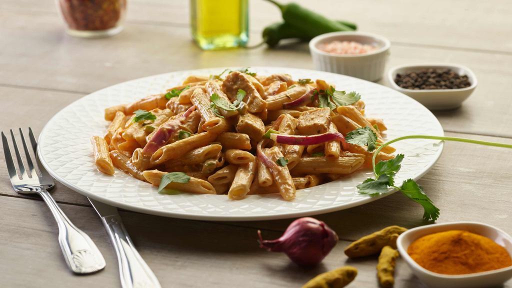 Butter Chicken Pasta Twist · This pasta has our signature butter sauce, All-Natural Garlic butter Breast, penne pasta, fresh sliced red  onions, and fresh cut; garlic, ginger, and green chilies, garnished with fresh cilantro.