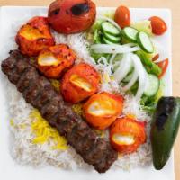 Combination Platter · M-grill chicken and beef koubideh skewers. Served with rice and salad. Side of homemade garl...