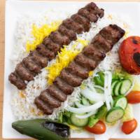 Persian Koubideh Beef · 2 skewers of seasoned and grilled ground beef. Served with rice and salad.