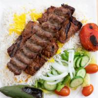  Soltani Kebab · Classic combination of barg kebab (tender steak filet) and ground beef koubideh. Served on a...