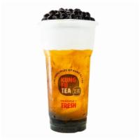 Green Tea Wow Milk Cap · Jasmine green tea sweetened with brown sugar bubbles and topped with a creamy milk cap