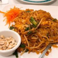 Pad Thai Noodles · Rice noodles with green onion, bean sprouts, bean cake, egg and a touch of chili powder. Veg...