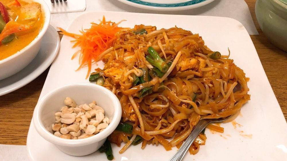 Pad Thai Noodles · Rice noodles with green onion, bean sprouts, bean cake, egg and a touch of chili powder. Vegetarian.