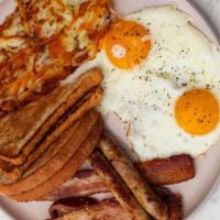 2 Egg Breakfast · Eggs (2 pieces), bacon (4 pieces), hash browns, toast.