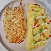 Salmon Lox Omelette · Local tomato, red onion, capers, green onions, sour cream, hash browns