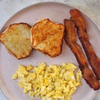 Kids Egg, Bacon & Toast · One egg cooked to your liking with a side of our toast with one strip of bacon! Add on any e...
