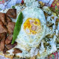 Chilaquiles · Green salsa. Tortilla chips covered with tomatillo sauce onion, cilantro, cheese and sour cr...