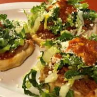 Order Of 3 Sopes · (3) Homemade sopes, topped with refried beans, choice of meat, lettuce, Mexican cheese, and ...