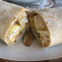 El Cochinito Breakfast Burrito · Choice of one meat: Bacon, Ham, or Chorizo. Includes: Refried beans, Potatoes, and Eggs