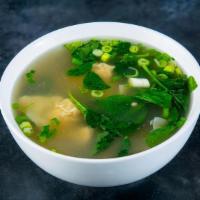 Large Wonton Soup · Choice of chicken or pork wontons, with
spinach and scallions in chicken broth.