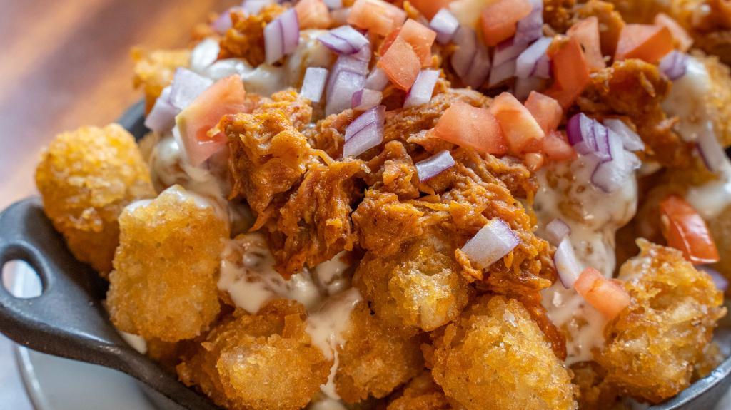 Loaded Tots · Pulled Pork, Tomato, Onion & House Cheese Sauce
NOT AVAILABLE SAT & SUN 10AM-2PM