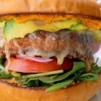 Veggie Burger · Beyond Meat Patty, White Cheddar Cheese, Pickled Onion, Avocado, Hummus & Fresh Produce