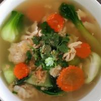 Wonton Soup · Shrimp wonton, chicken and bok choy in clear broth.
