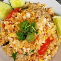 Crab Fried Rice · Crab, rice, egg, tomato, onion, scallion and cilantro.