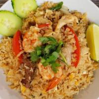 Combination Fried Rice · Chicken, beef, shrimp, egg, tomato, onion and scallions.