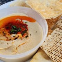 Hummus · Vegetarian. Gluten-free. Lactose-free. Made with chickpeas, tahini, olive oil, and garlic. S...