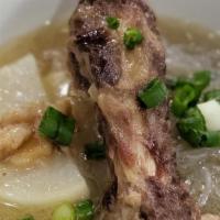 Galbitang · Korean Beef Bone soup, Ajitama, Radish, glass noodle and garnished with green onion