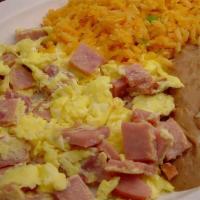 Huevos Con Jamon · Diced ham scrambled with two eggs. Served with rice, beans and choice of tortillas.