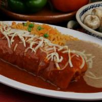 Wet Burrito Plate · Wet burrito in red or green salsa with your choice of meat, rice, beans, onion, cilantro. Se...