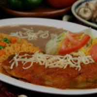 Chile Relleno · Fried battered chile stuffed with cheese and served with rice, beans, salad, and tortillas.