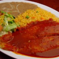 Filete A La Diabla · Fresh fish filet topped with a spicy red sauce and served with rice, beans, salad, and torti...