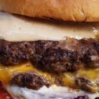 Double Cheeseburger · Brioche bun ,Aioli, lettuce onion, tomato thousand iceland ,double meat patty w/cheeses