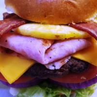 Hawaiian Burger · w/slice of fresh grilled pineapple, 2 slices of bacon & grilled ham.