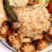 Chicken Breast Kebab With Sides · All plates include choices of Rice pilaf or French fries, Side salad - garden or Caesar, Sid...