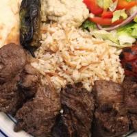 Beef Tenderloin Kebab Plate · All plates include choices of Rice pilaf or French fries, Side salad - garden or Caesar, Sid...