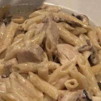Penne Napoli · Chicken and mushrooms sauteed in a cream sauce tossed with penne pasta.