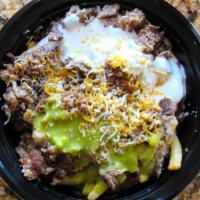 Carnitas Fries · Sour cream, guacamole, beans, cheese and meat