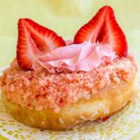 Strawberry Shortcake  · A glazed donut dipped in sweet cream cheese, topped with strawberry cake crumble, strawberry...