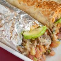 Grilled Burrito · Flour tortilla, rice, beans, cheese, choice of meat, pico de gallo, guacamole, sour cream, a...