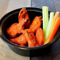 Classic Wings · Served with celery, carrots and choice of ranch or bleu cheese dipping sauce.