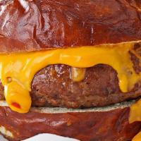 Cheeseburger · 8 oz. house-ground beef patty, provolone cheese, brioche bun, garlic aioli, lettuce, onions,...