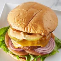 Vegan Flex  · Veggie Patty Topped with Vegan cheese, lettuce tomato, onions, pickles and secret sauce. (co...