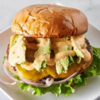 The Cali Flex  · Seasoned beef patty topped with melted American cheese, avocado sitting on lettuce, tomato, ...
