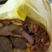 Breakfast Burrito · Eggs, cheese, hashbrowns, and salsa. Add bacon, ham, sausage or chorizo for an additional ch...