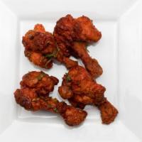 Chicken Lollipop · Winglets marinated with spices and deep fried.
