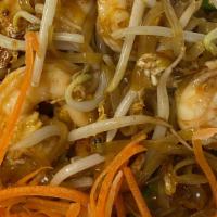Pad Thai · Pan-fried rice noodles with egg, bean sprouts, green onion and ground peanuts.