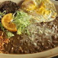 Steak & Eggs · Grilled Asada steak with two eggs, any style, served with rice, beans and tortillas.