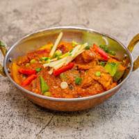 Chicken Kadai · Stir fried with fresh tomatoes, onions and bell peppers. Very traditional!