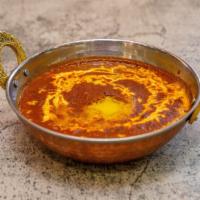 Dal Makhani · A mixture of lentils and kidney-beans cooked with butter & spices.
