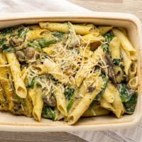 Penne Alfredo · Gluten-free penne noodles in a rich and creamy lemon cashew alfredo sauce with sautéed spina...