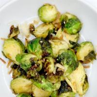 Brussels Sprout · Vegan. Crispy brussels sprout tossed in garlic soy.