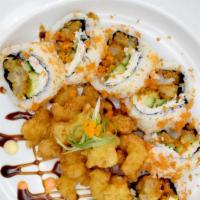 Lobster Crunch  Roll · Lightly fried Lobster on crispy crumbs, avocado, cucumber roll, smelt egg, and green onion.