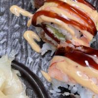 Tiger Roll · In spicy tuna, crabmeat, avocado. Out shrimp, avocado with spicy mayo and eel sauce.