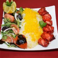 Lamb Kabob · 1 skewer of fresh lamb fillet served with grilled veggies. Includes basmati rice and salad.